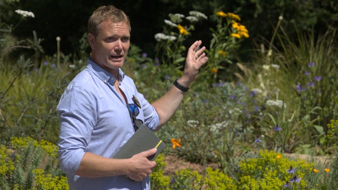 Designer Joe Perkins speaking at the Garden for the Future Launch event